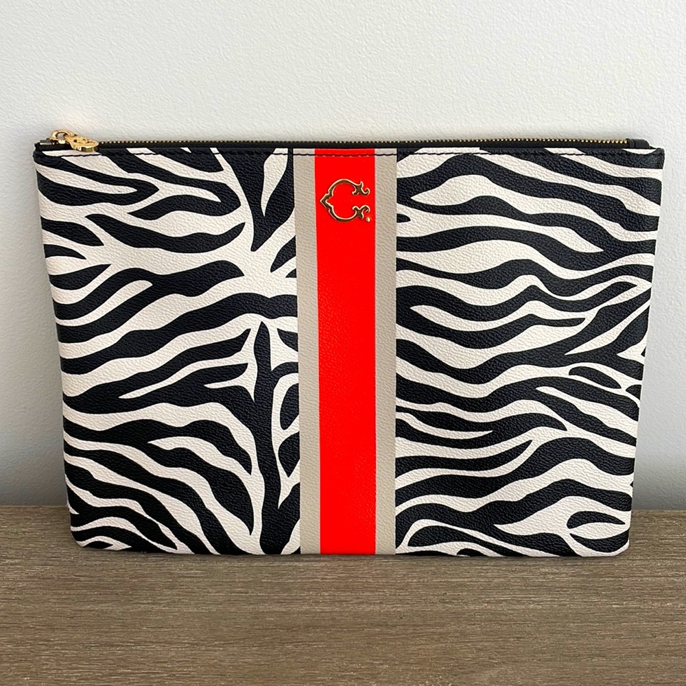 C. Wonder ZEBRA print clutch